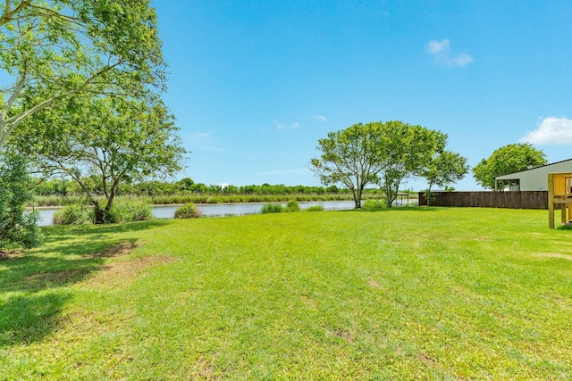 1927 Duncan Dr, Oyster Creek, TX 77541 - view of yard with a water view