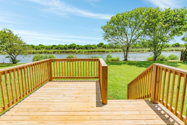 1927 Duncan Dr, Oyster Creek, TX 77541 - wooden deck with a water view and a lawn