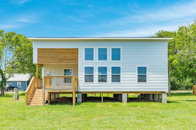 1927 Duncan Dr, Oyster Creek, TX 77541 - back of property featuring a deck, a yard, and stairway