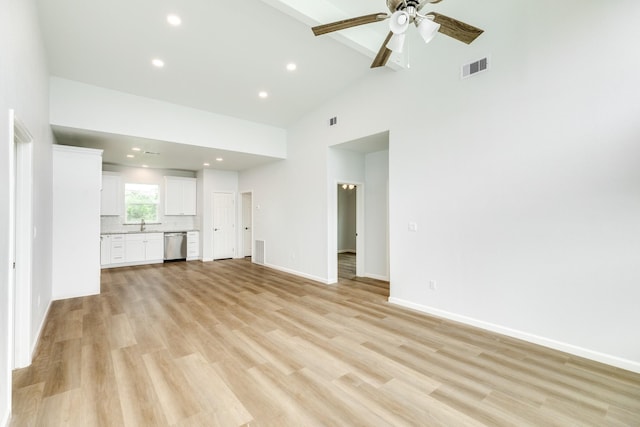 1927 Duncan Dr, Oyster Creek, TX 77541 - unfurnished living room featuring high vaulted ceiling, light wood-style floors, a ceiling fan, and recessed lighting