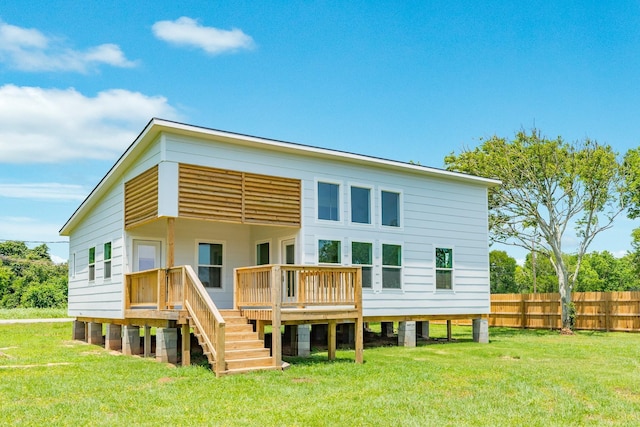 1927 Duncan Dr, Oyster Creek, TX 77541 - rear view of house with a deck