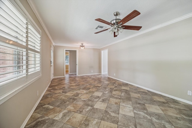1905 17th Ave N, Texas City, TX 77590 - empty room with healthy amount of natural light, stone finish floors, ceiling fan, and crown molding