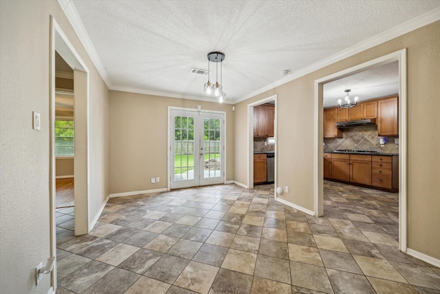 1905 17th Ave N, Texas City, TX 77590 - unfurnished dining area featuring a chandelier, crown molding, a textured ceiling, french doors, and light stone finish floors