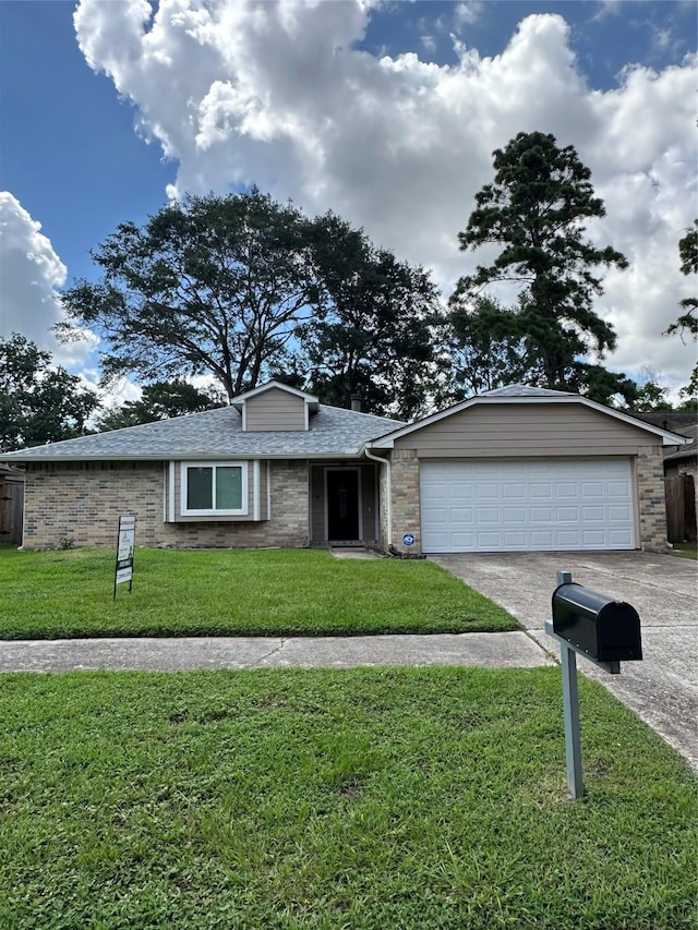 9219 Benwick Dr, Spring, TX 77379 - ranch-style house featuring concrete driveway, an attached garage, a front lawn, and roof with shingles