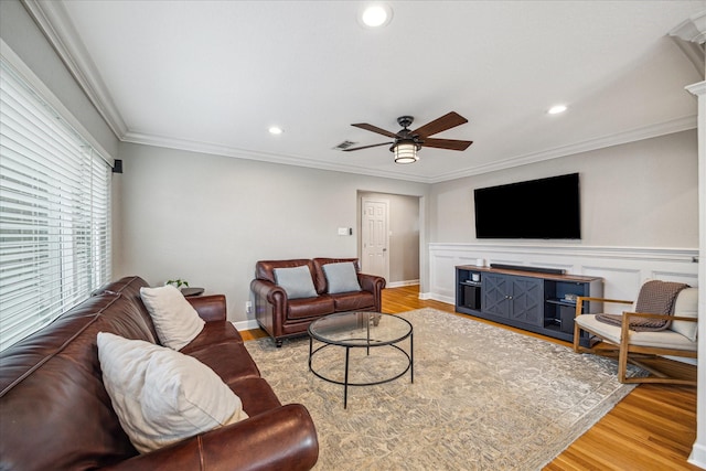 6518 Lindyann Ln, Houston, TX 77008 - living room with ceiling fan, light wood-style floors, recessed lighting, and crown molding