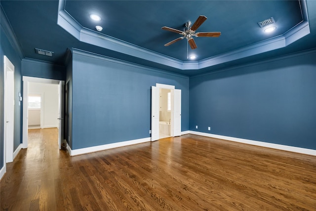 829 Wakefield Dr Unit A, Houston, TX 77018 - empty room with a raised ceiling, crown molding, ceiling fan, and wood finished floors