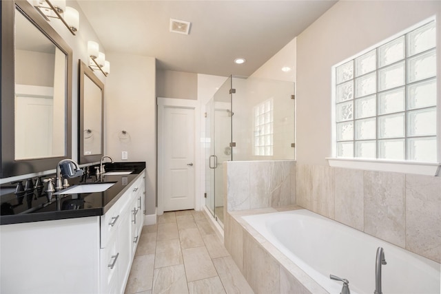 829 Wakefield Dr Unit A, Houston, TX 77018 - full bath with a garden tub, double vanity, and a stall shower