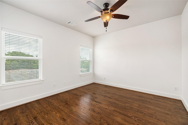 829 Wakefield Dr Unit A, Houston, TX 77018 - empty room with a ceiling fan and dark wood-style flooring