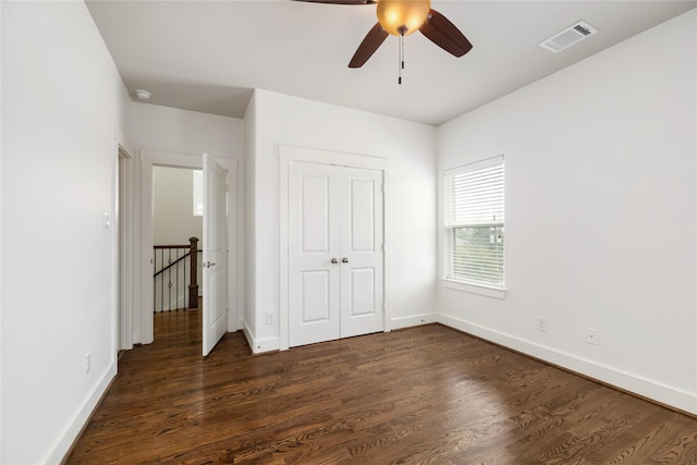 829 Wakefield Dr Unit A, Houston, TX 77018 - unfurnished bedroom featuring dark wood-style flooring, a closet, and ceiling fan