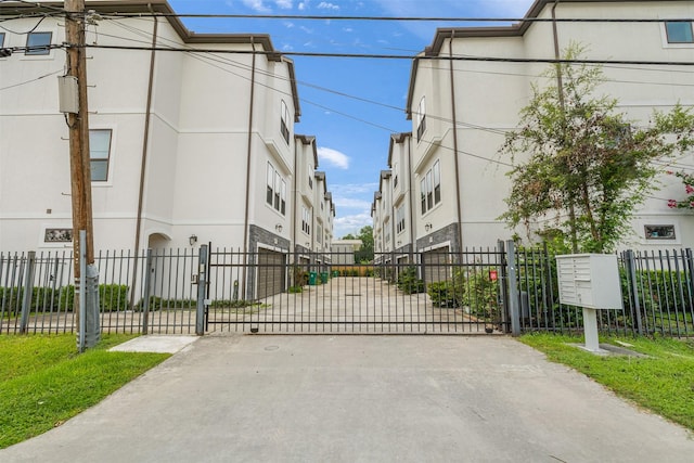 829 Wakefield Dr Unit A, Houston, TX 77018 - view of concrete driveway with a gate and a gated entry