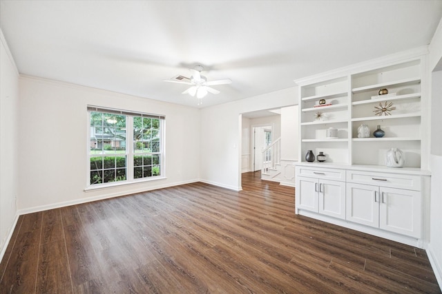10014 Moorberry Ln, Houston, TX 77080 - unfurnished room featuring dark wood finished floors, ceiling fan, and stairs