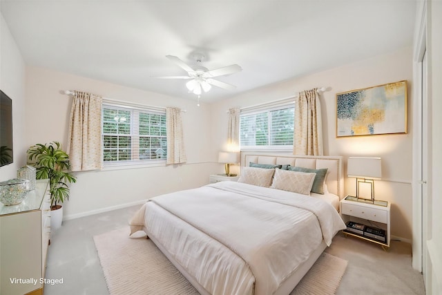 10014 Moorberry Ln, Houston, TX 77080 - bedroom featuring multiple windows, carpet flooring, and ceiling fan