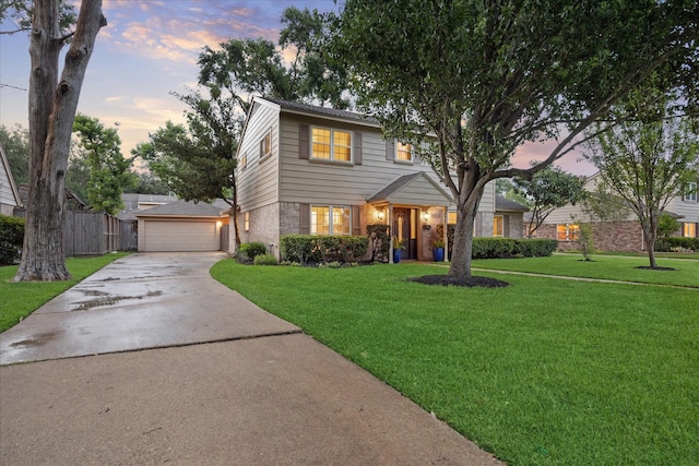 10014 Moorberry Ln, Houston, TX 77080 - view of front facade featuring a garage, brick siding, and driveway
