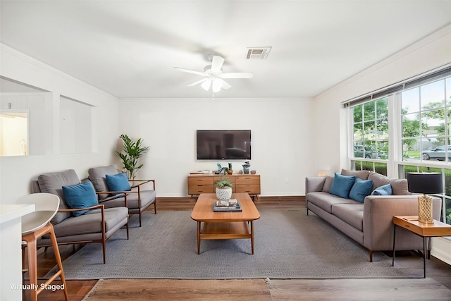 10014 Moorberry Ln, Houston, TX 77080 - living area with crown molding, a ceiling fan, and wood finished floors