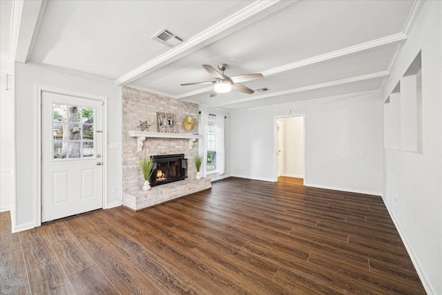 10014 Moorberry Ln, Houston, TX 77080 - unfurnished living room featuring ornamental molding, dark wood-style flooring, a brick fireplace, and ceiling fan