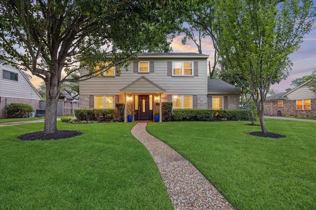 10014 Moorberry Ln, Houston, TX 77080 - view of front of house with a yard and brick siding