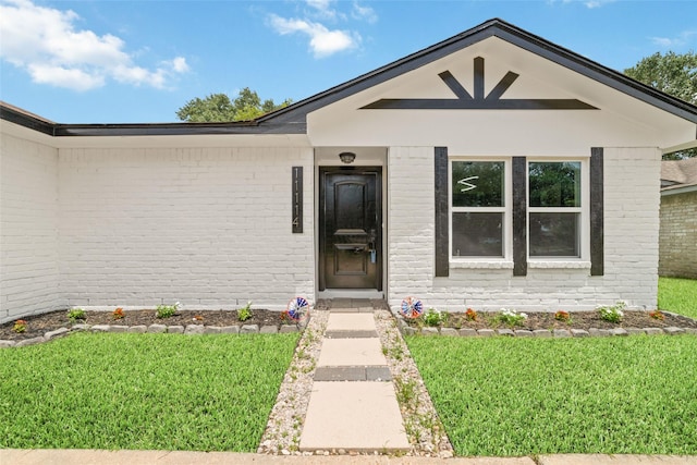11114 Daybreak Ln, Cypress, TX 77429 - property entrance with brick siding and a lawn