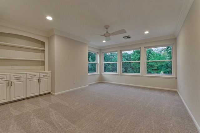 62 N Turtle Rock Ct, The Woodlands, TX 77381 - spare room with crown molding, a ceiling fan, light carpet, plenty of natural light, and recessed lighting