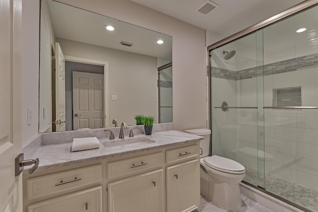 62 N Turtle Rock Ct, The Woodlands, TX 77381 - full bathroom with vanity, a shower stall, and recessed lighting