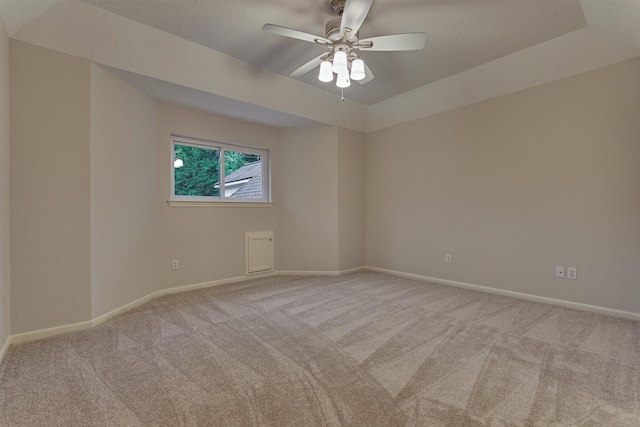 62 N Turtle Rock Ct, The Woodlands, TX 77381 - carpeted spare room with a ceiling fan and baseboards