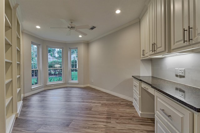 62 N Turtle Rock Ct, The Woodlands, TX 77381 - interior space featuring ceiling fan, crown molding, dark wood-style flooring, and recessed lighting