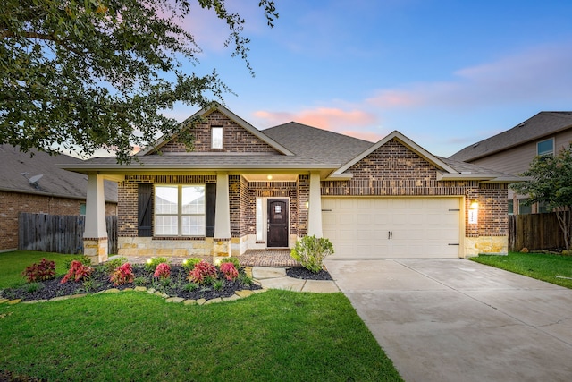 23414 Bracino Lake Dr, Katy, TX 77493 - view of front of house with concrete driveway, an attached garage, roof with shingles, stone siding, and brick siding