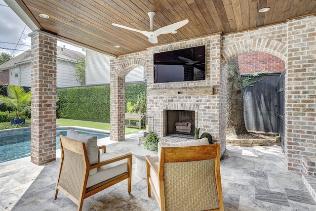 3739 University Blvd, Southside Place, TX 77005 - view of patio with an outdoor brick fireplace, a ceiling fan, and an outdoor pool