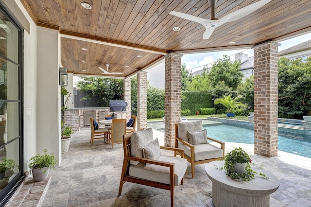 3739 University Blvd, Southside Place, TX 77005 - view of patio / terrace with area for grilling, ceiling fan, an outdoor pool, and outdoor dining space