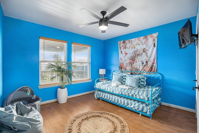 23101 Camino St, Galveston, TX 77554 - bedroom featuring wood finished floors and ceiling fan
