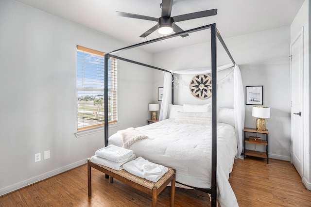 23101 Camino St, Galveston, TX 77554 - bedroom with wood finished floors and a ceiling fan