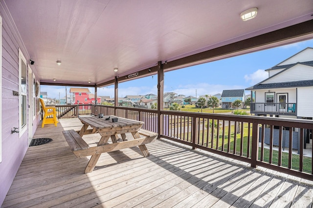 23101 Camino St, Galveston, TX 77554 - wooden deck featuring a residential view