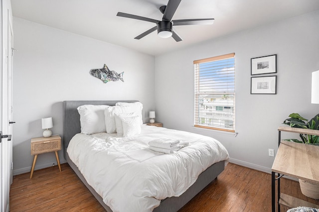 23101 Camino St, Galveston, TX 77554 - bedroom with wood finished floors and a ceiling fan