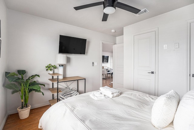23101 Camino St, Galveston, TX 77554 - bedroom featuring wood finished floors and ceiling fan