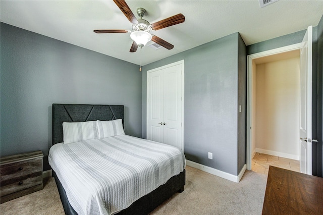 19723 Alton Springs Dr, Cypress, TX 77433 - bedroom with a closet, light carpet, and ceiling fan