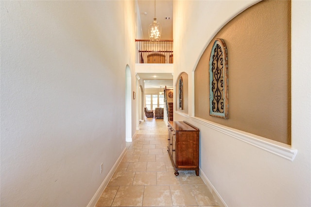 19723 Alton Springs Dr, Cypress, TX 77433 - corridor featuring arched walkways and light tile patterned floors