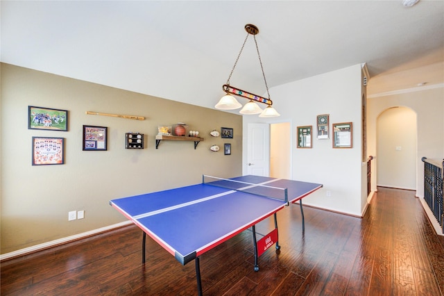 19723 Alton Springs Dr, Cypress, TX 77433 - game room featuring arched walkways and dark wood-style floors