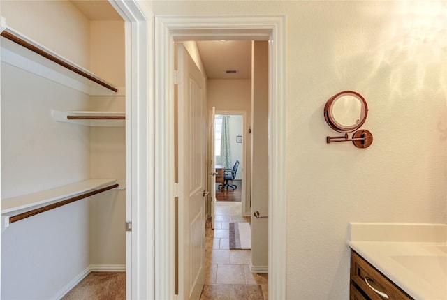 19723 Alton Springs Dr, Cypress, TX 77433 - bathroom with vanity and stone tile flooring