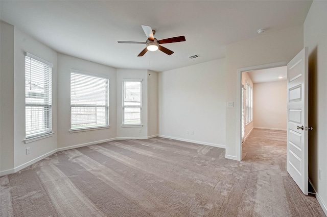 18822 Fulvetta Haven Way, Richmond, TX 77407 - empty room with a ceiling fan, light carpet, and a smoke detector