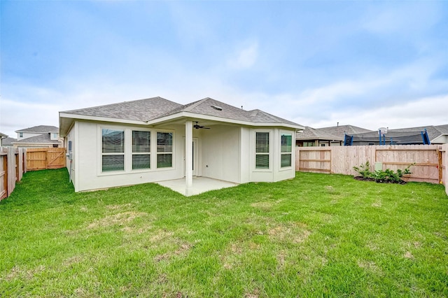 18822 Fulvetta Haven Way, Richmond, TX 77407 - back of house with a ceiling fan, a fenced backyard, a patio, and roof with shingles