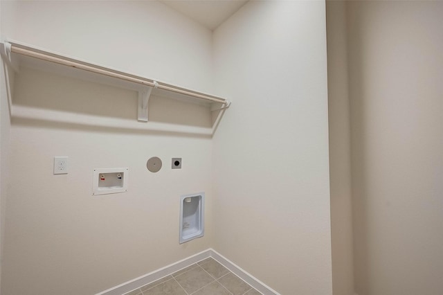18822 Fulvetta Haven Way, Richmond, TX 77407 - laundry room featuring hookup for an electric dryer, hookup for a gas dryer, hookup for a washing machine, and tile patterned floors