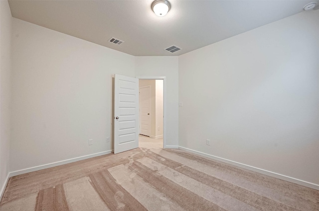 18822 Fulvetta Haven Way, Richmond, TX 77407 - spare room featuring a smoke detector and light colored carpet