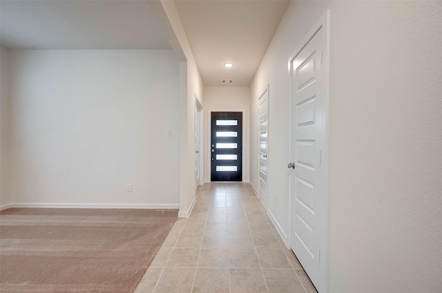 18822 Fulvetta Haven Way, Richmond, TX 77407 - entryway featuring light tile patterned floors and baseboards