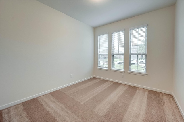 18822 Fulvetta Haven Way, Richmond, TX 77407 - empty room with baseboards and light carpet