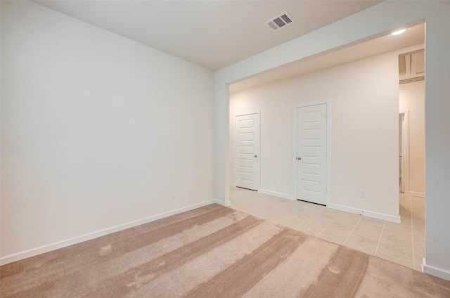18822 Fulvetta Haven Way, Richmond, TX 77407 - unfurnished room with light colored carpet and light tile patterned flooring