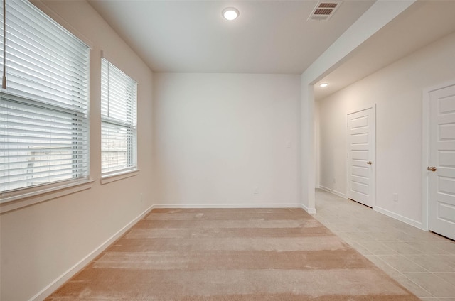 18822 Fulvetta Haven Way, Richmond, TX 77407 - empty room featuring recessed lighting and light tile patterned floors