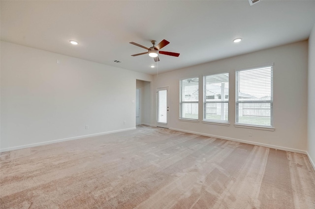 18822 Fulvetta Haven Way, Richmond, TX 77407 - unfurnished room featuring ceiling fan, plenty of natural light, light carpet, and recessed lighting