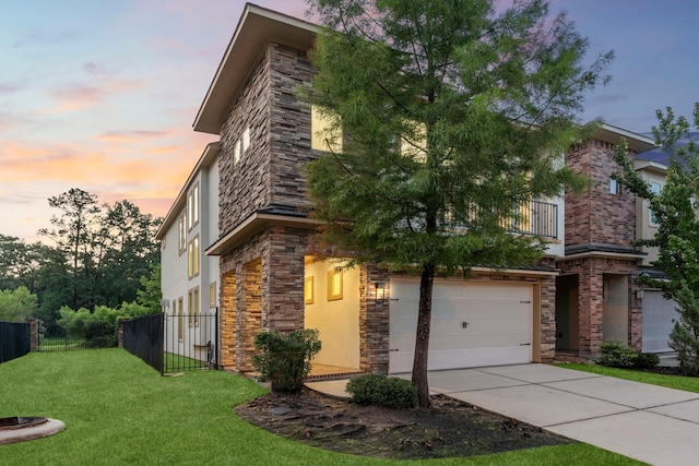 127 Benjis Pl, The Woodlands, TX 77380 - modern home with stucco siding, concrete driveway, stone siding, a balcony, and an attached garage