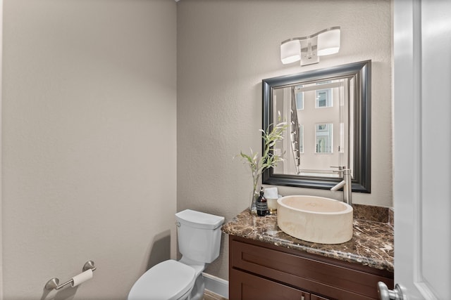 127 Benjis Pl, The Woodlands, TX 77380 - bathroom featuring vanity and a textured wall