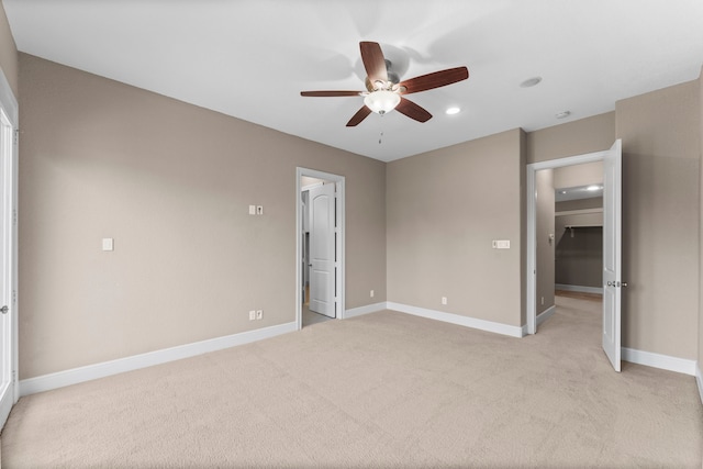 127 Benjis Pl, The Woodlands, TX 77380 - unfurnished bedroom with light colored carpet, recessed lighting, and ceiling fan
