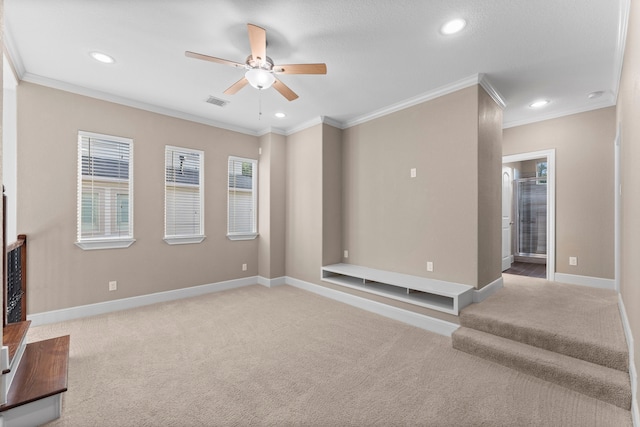 127 Benjis Pl, The Woodlands, TX 77380 - unfurnished living room with carpet floors, a ceiling fan, ornamental molding, and recessed lighting